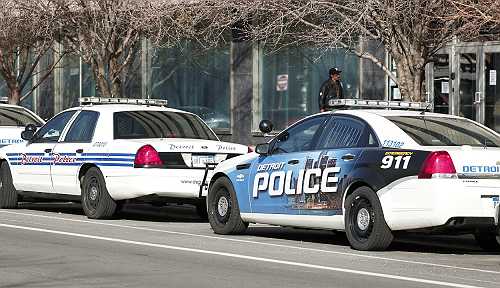 Black Detroit cop manhandled, cuffed by fellow white officer over what was in his hand - theGrio